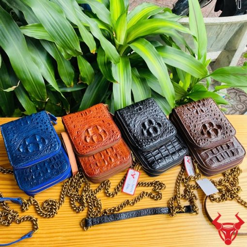Hình ảnh túi đựng điện thoại da gù cá sấu xanh navy cao cấp, bền bỉ, năng động, tiện dụng.