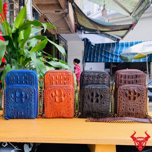 Hình ảnh túi đựng điện thoại da gù cá sấu màu xanh navy cao cấp, bền bỉ, năng động, tiện dụng.