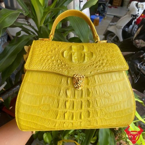 Túi da cá sấu HM-1 màu vàng, phụ kiện thời trang đắt giá.