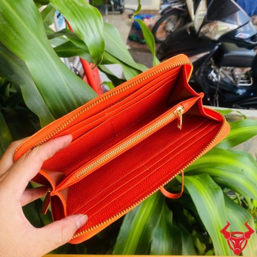 Ví da cam handmade, chất liệu cá sấu thật, cầm tay nữ giới.
