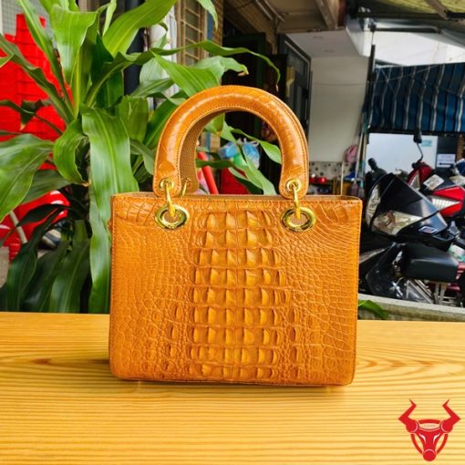 Túi xách thời trang da cá sấu gù vàng bò sang chảnh
