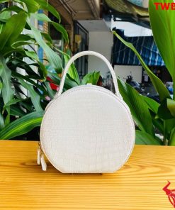 Túi xách cá sấu, thanh lịch, tinh tế.