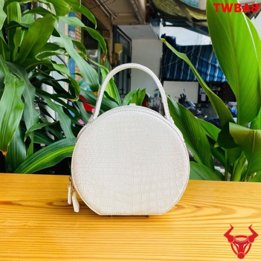 Túi xách cá sấu, thanh lịch, tinh tế.